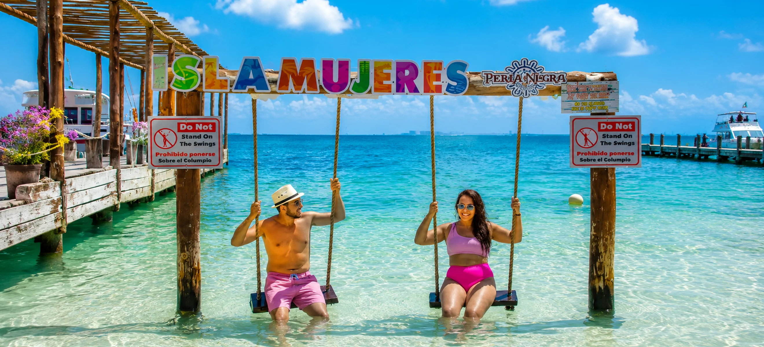 Isla Mujeres beach swings with turquoise Caribbean water during a Cancun catamaran excursion